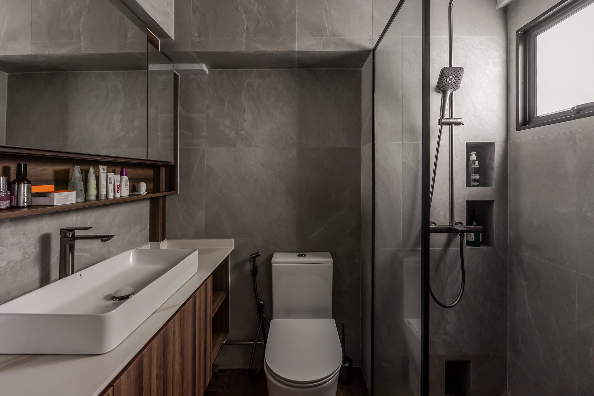 Modern HDB apartment renovation with custom carpentry and neutral oak palette